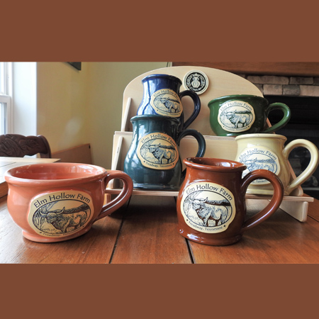 A variety of mug styles with the Elm Hollow Farm vintage-style logo on them